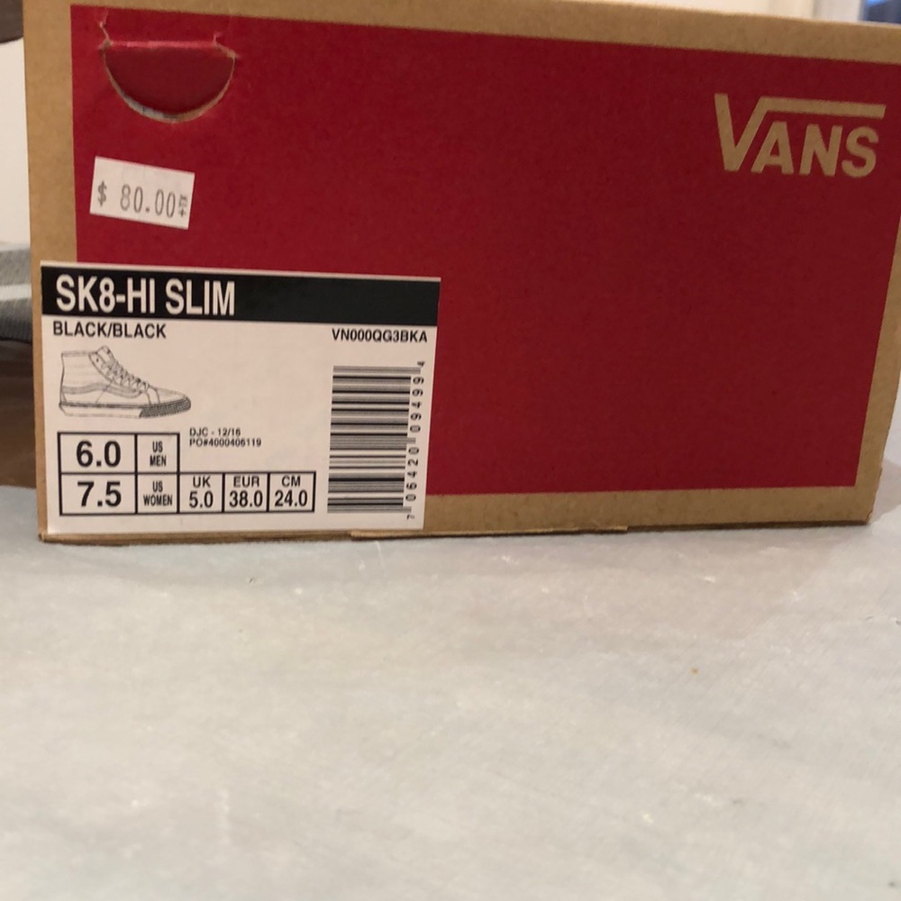 Vans  black shoe high top shoes, size 7.5 women, 6 men. Worn in house once.